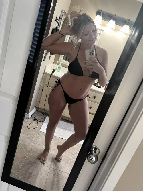 Blonde in a black bikini 