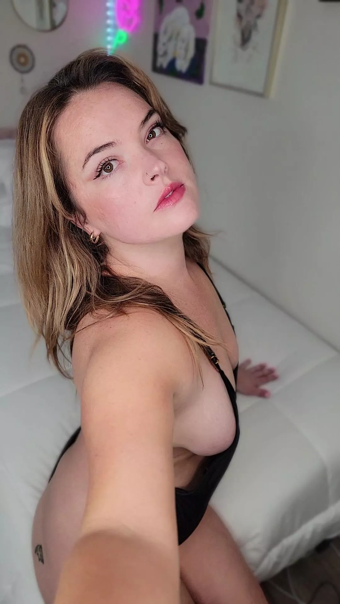 So much side boob in this barely-there body suit