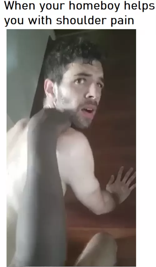 Giving him a shoulder massage