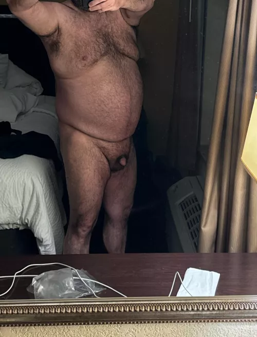 Standing in front of the hotel window 