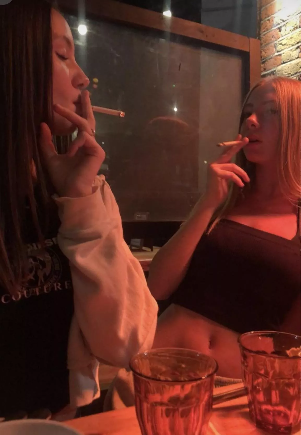 They found a quiet corner of the restaurant, lowered a window, and enjoyed a few cigarettes with their drinks