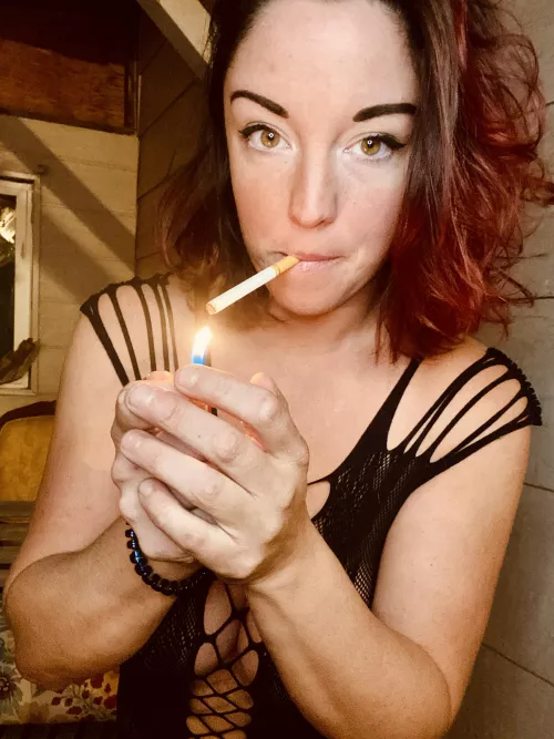 Smoking cigs in lingerie ! 