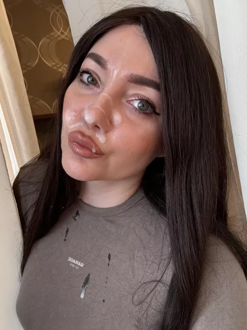 Pretty face dripping with cum