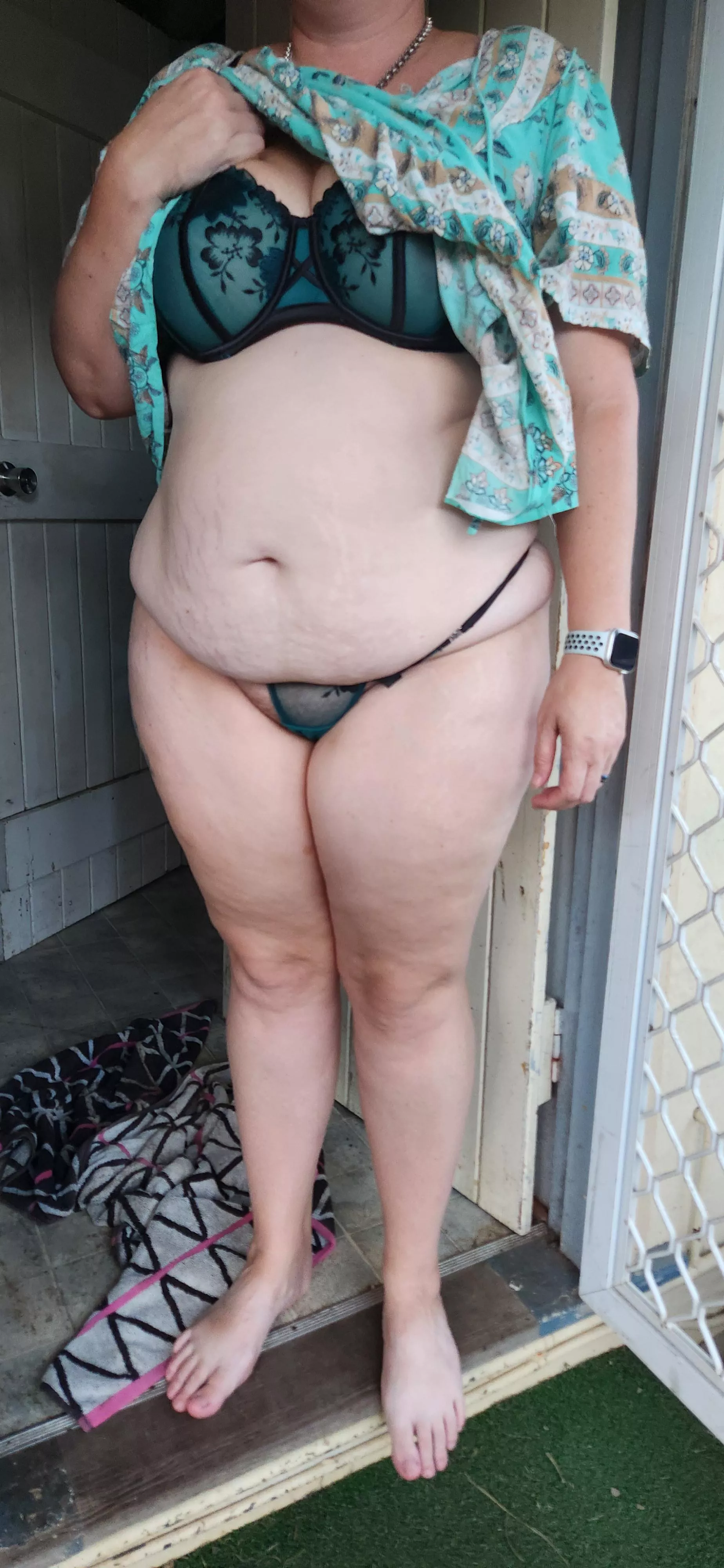 Showing the guy mowing my lawn my preggo belly