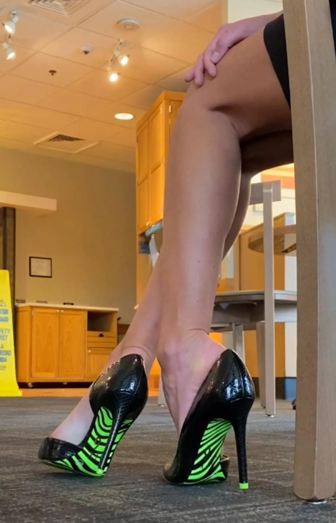 Feeling feisty waiting at the cafe with my green zebra striped pumps 🦓 👠 