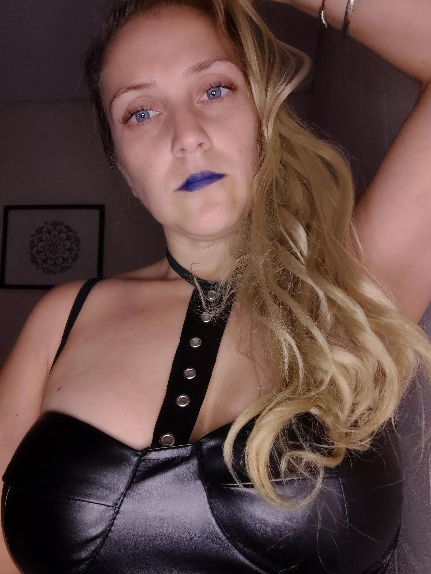 I took this photo while my sex slave was on the bedroom caged.