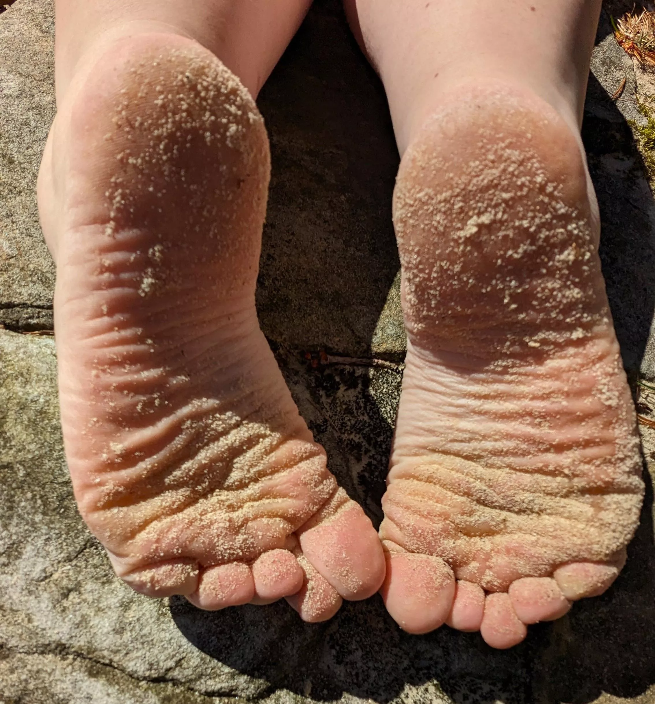 Sandy toes and soles