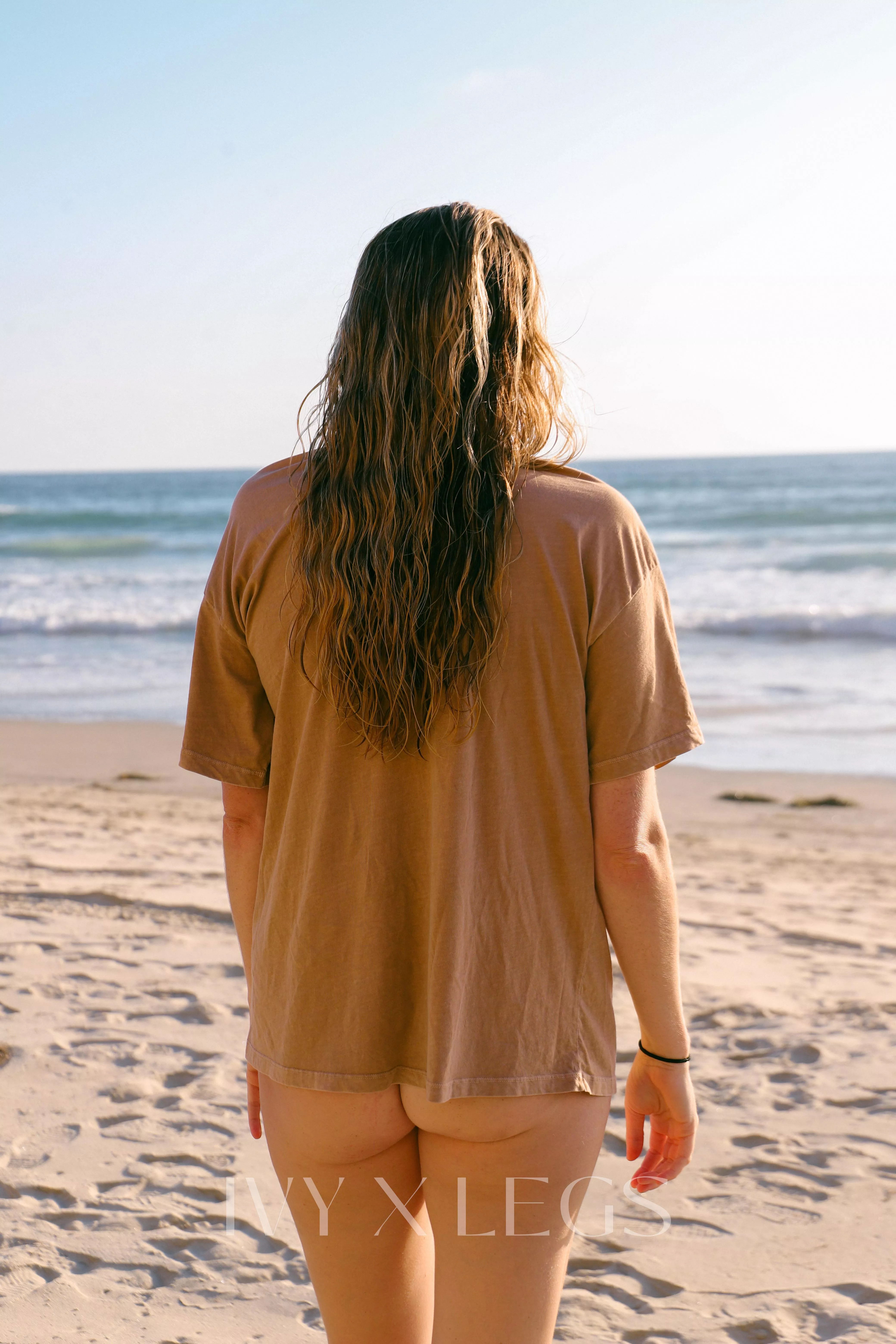 Keeping an eye out for surfers so I can take my shirt off 