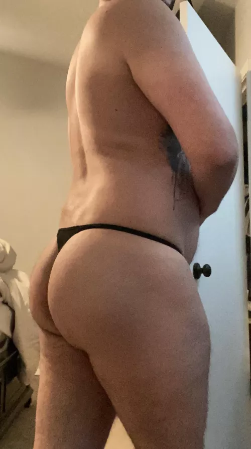 Working out in nothing but a thong.