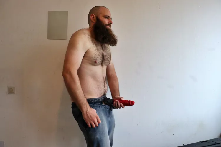 Me, while I'm holding a large red dildo in front of me