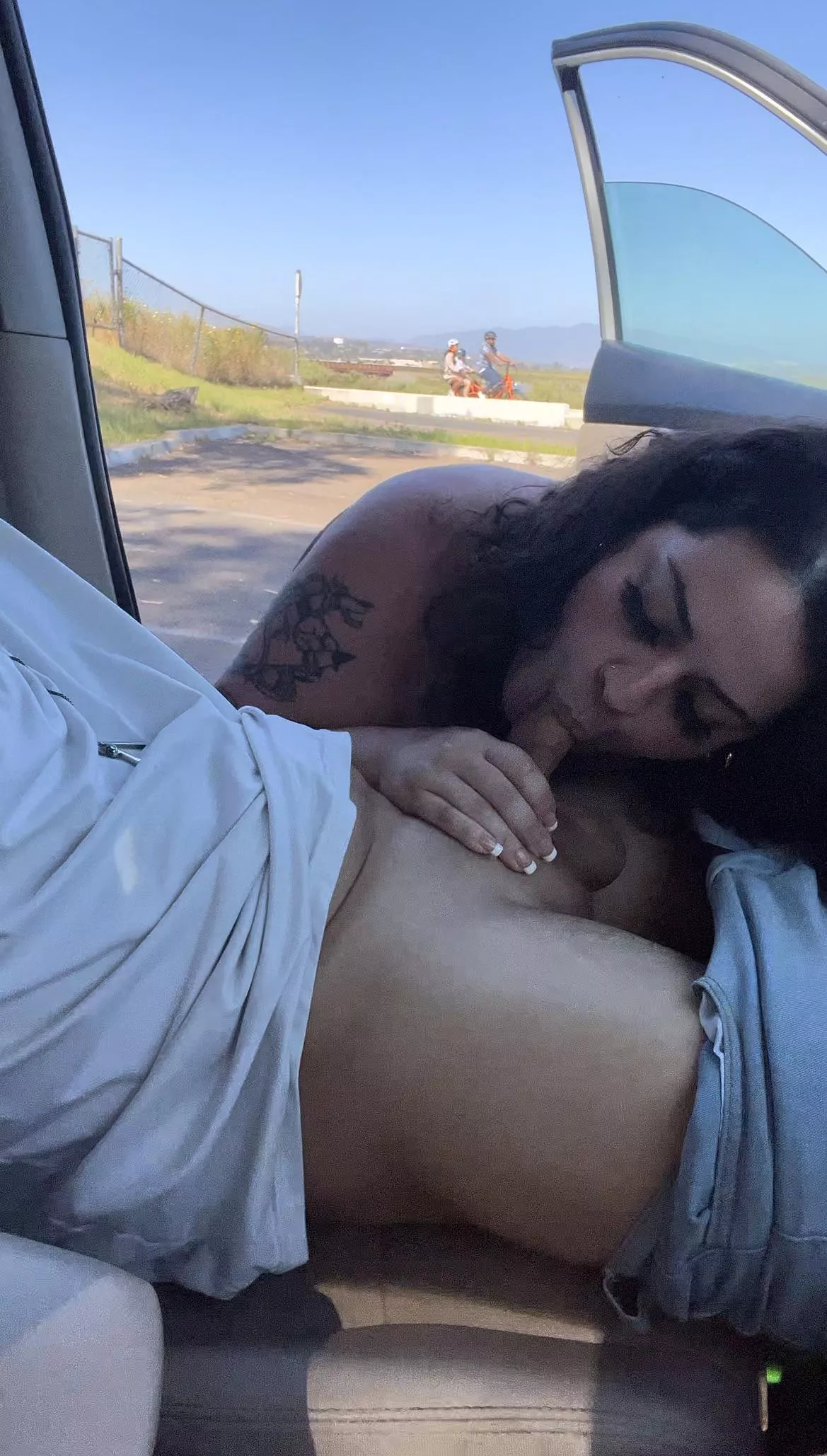 People passing as I’m flashing my holes and sucking cock