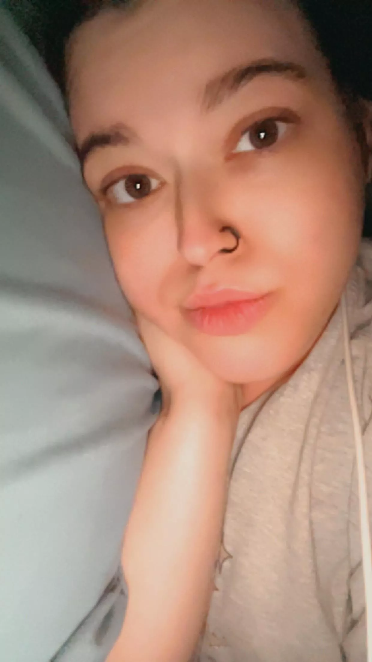 snuggled into bed lol