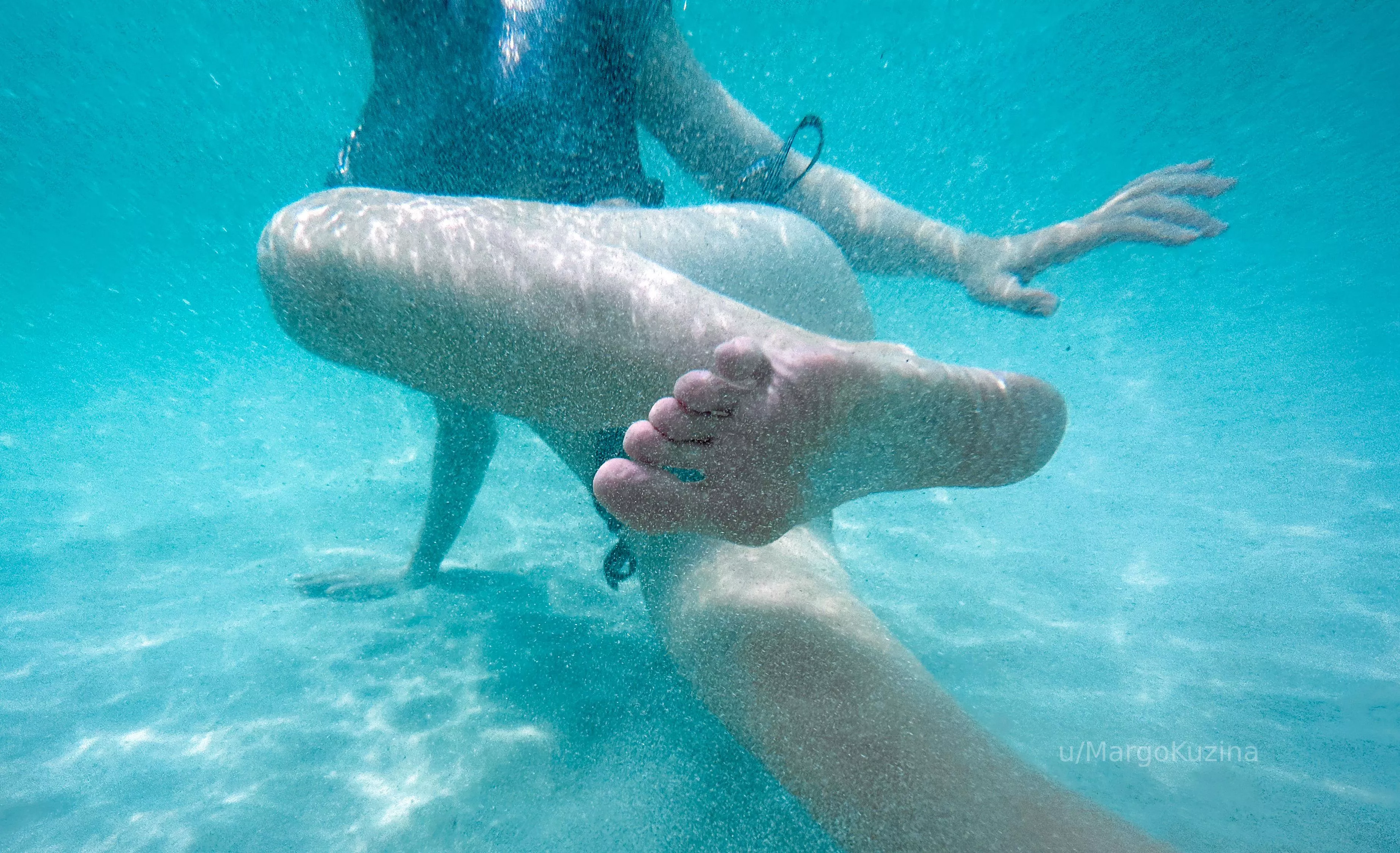 Underwater photography, where the legs do the talking