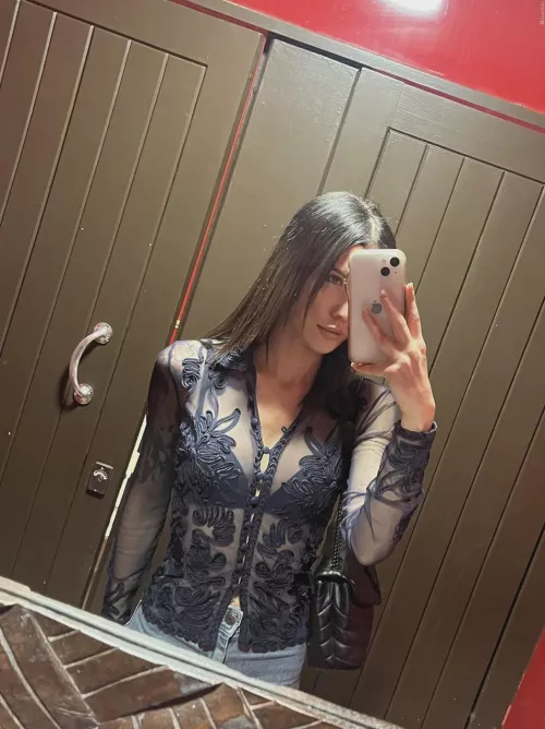 That pattern doesn't exactly hide her bra in her sheer shirt