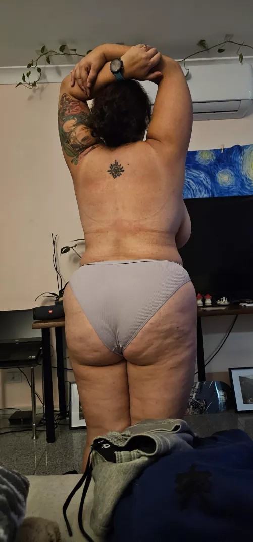 The wife stretching before bed