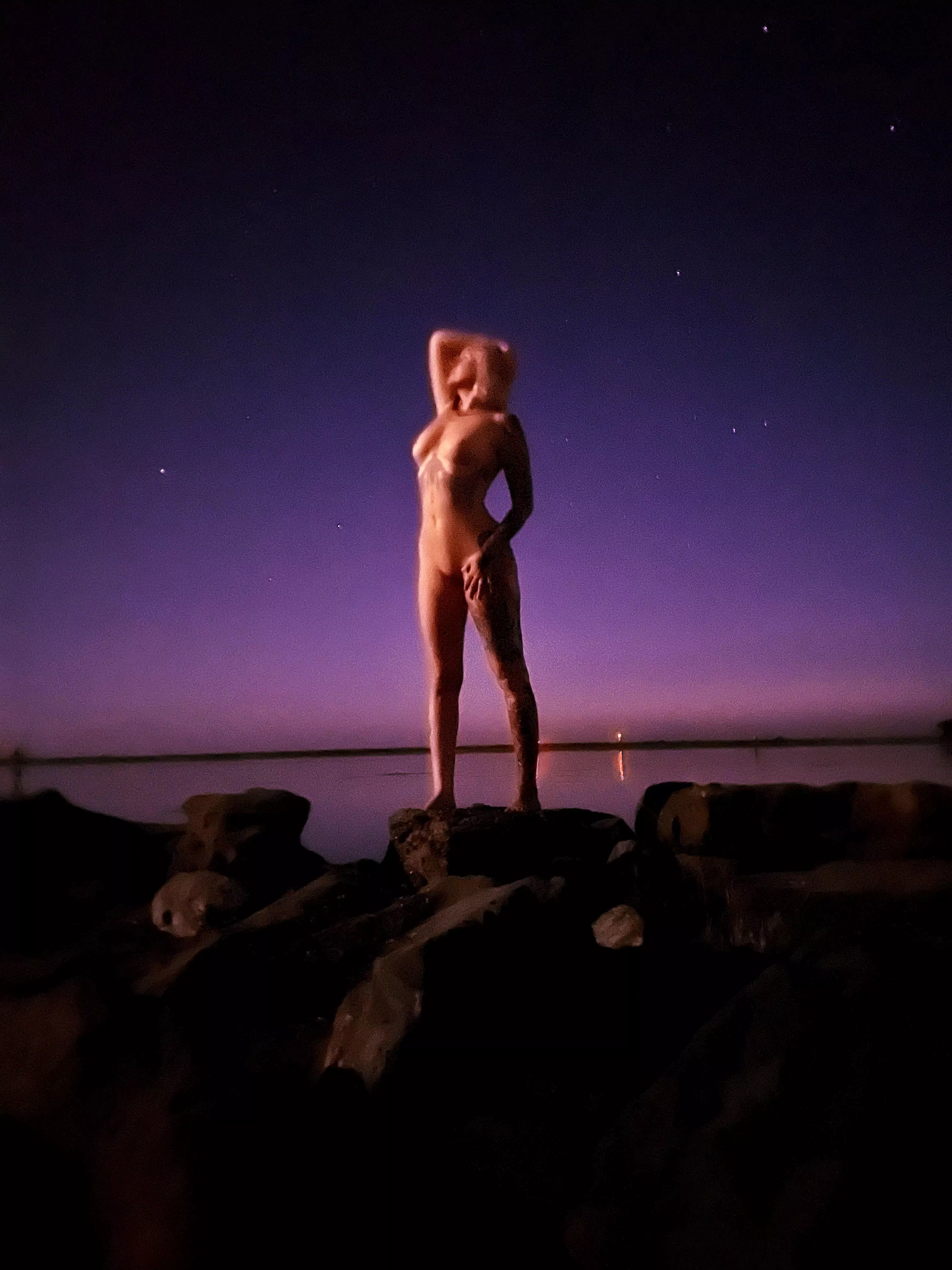 Nudey night on the beach rocks