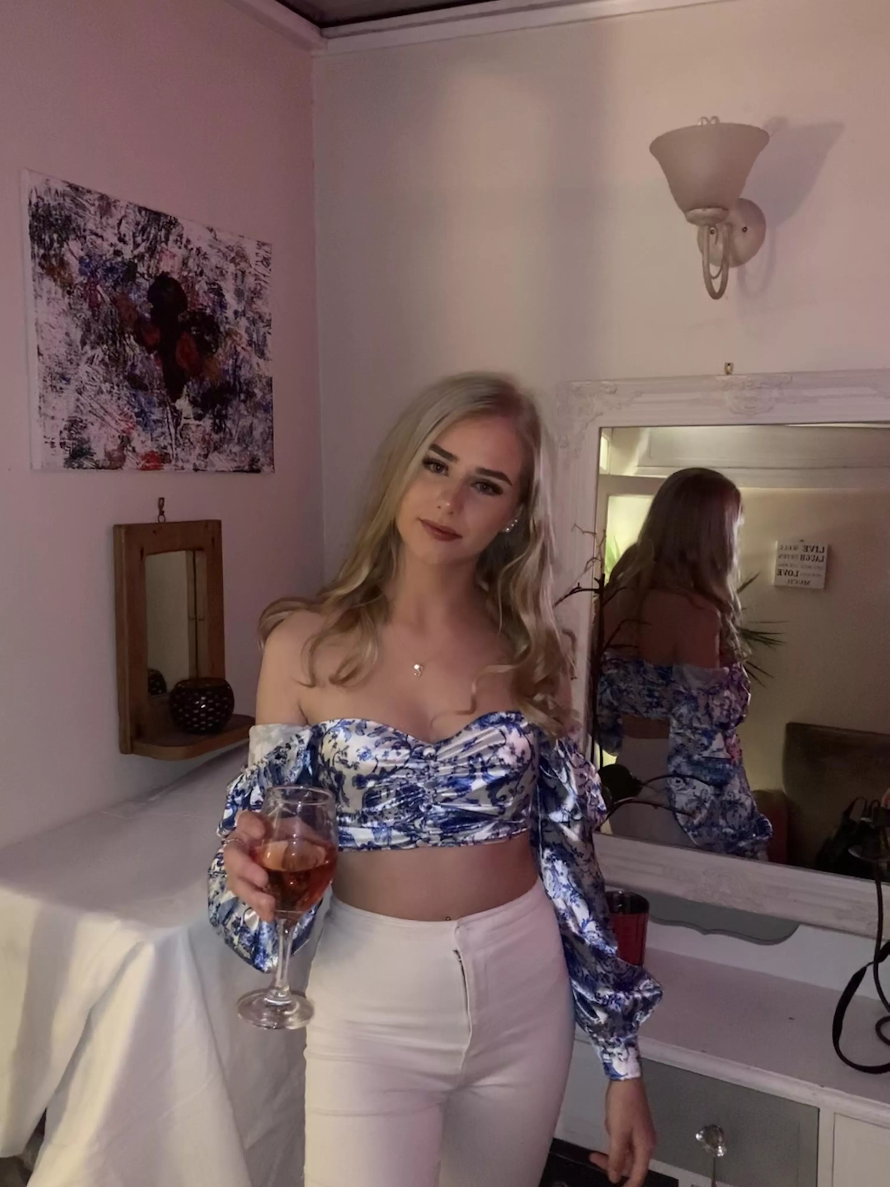 
Am I enhancing the appeal of this crop top, or is it the garment that's making me shine?