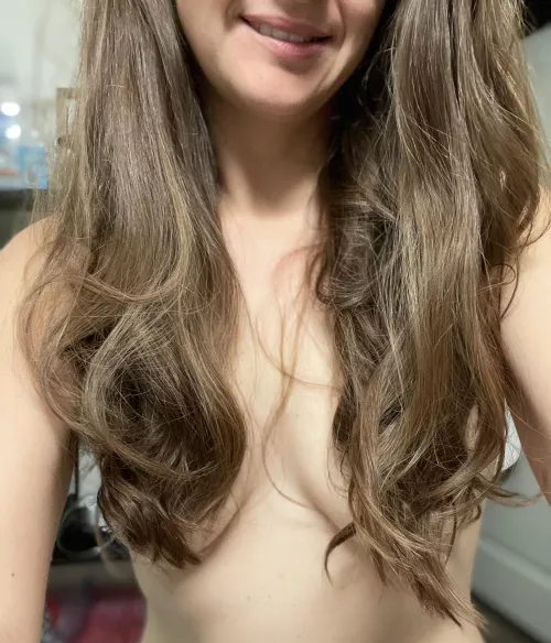 Who needs a bra when you have long hair?