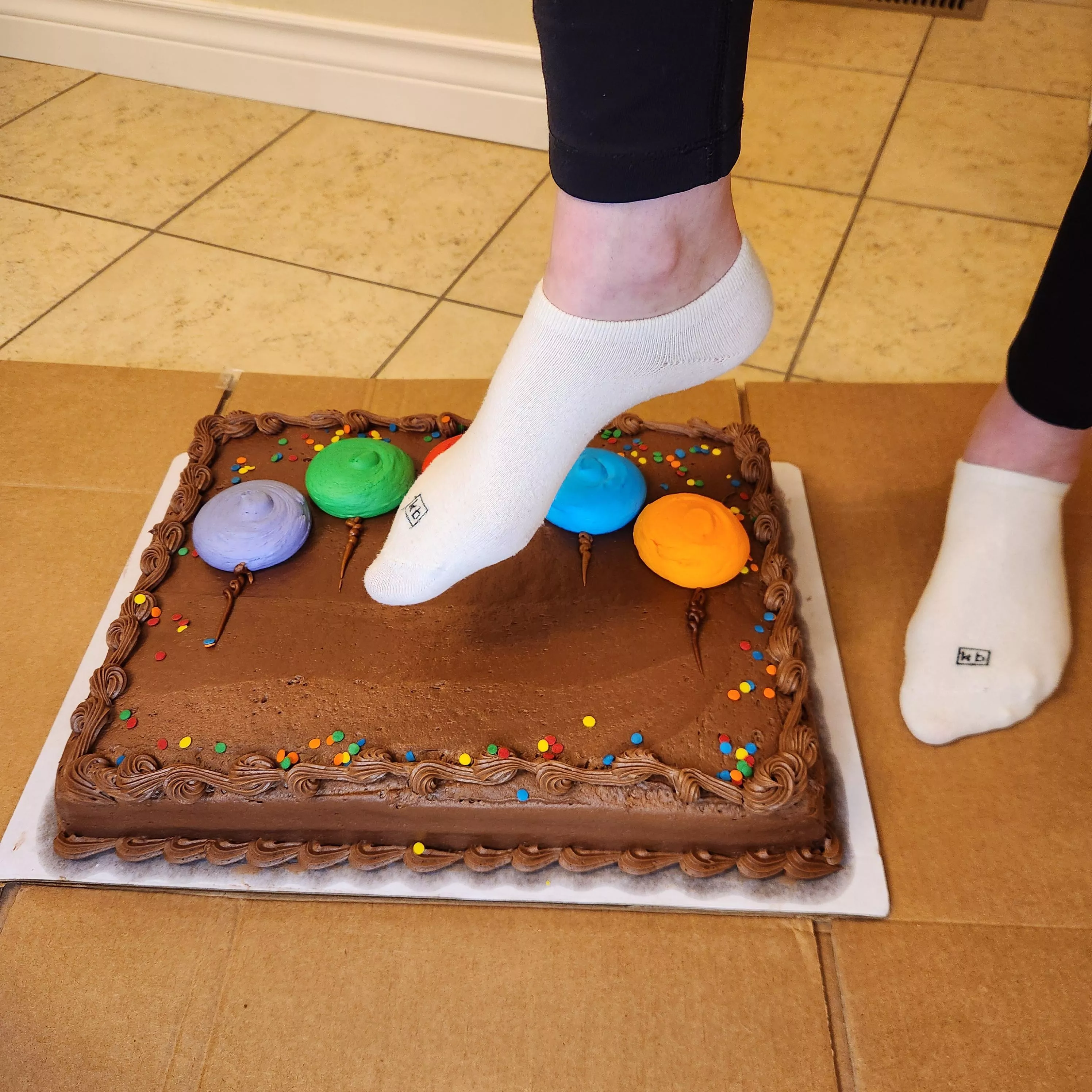 Another cake destroyed by my cute white socks