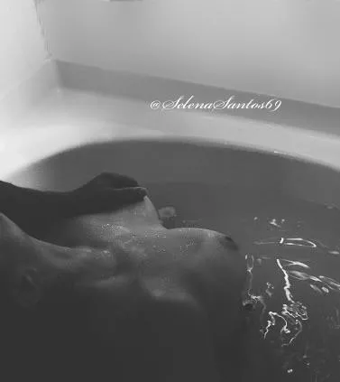 In the tender touch of love, amidst the tranquil of a warm bath.