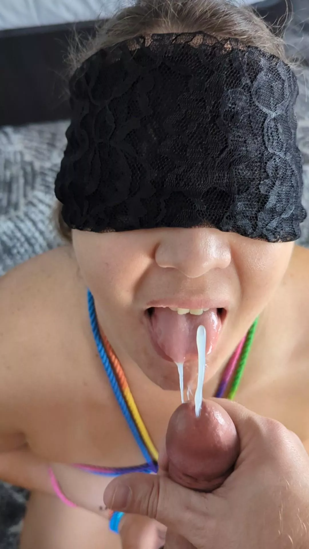 Capturing the cum shot as it lands on my waiting tongue