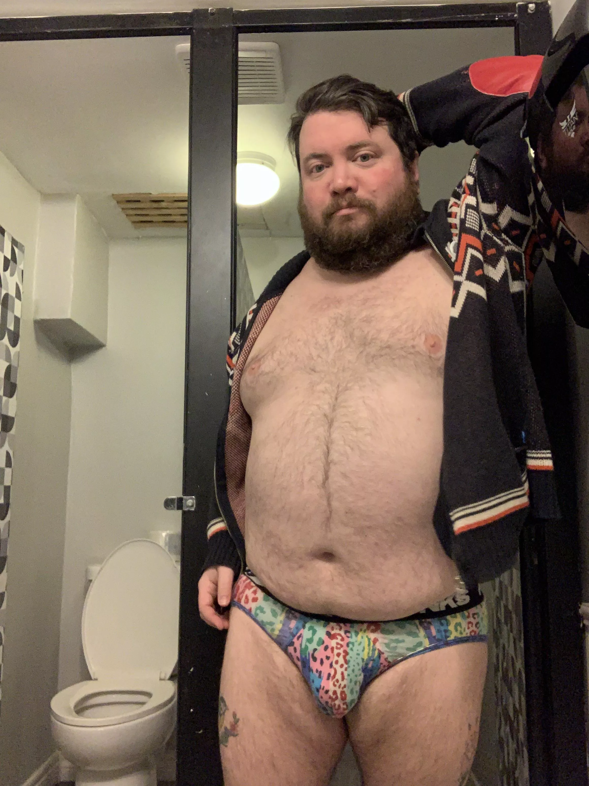 In a colourful pair of briefs. 