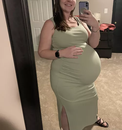Do you like how tight my dress is on my pregnant belly?🥵