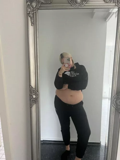 My black outfit can barely contain my big belly