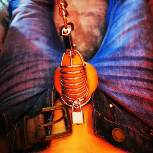 My little sissy cock leashed by my owner ....