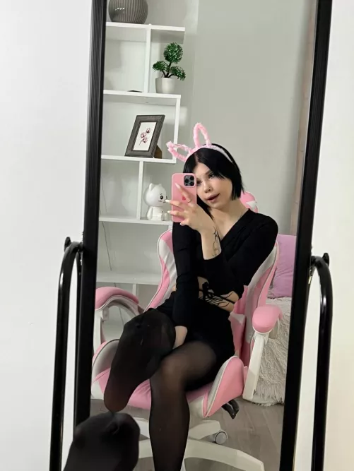 Lustful black bunny with pink ears