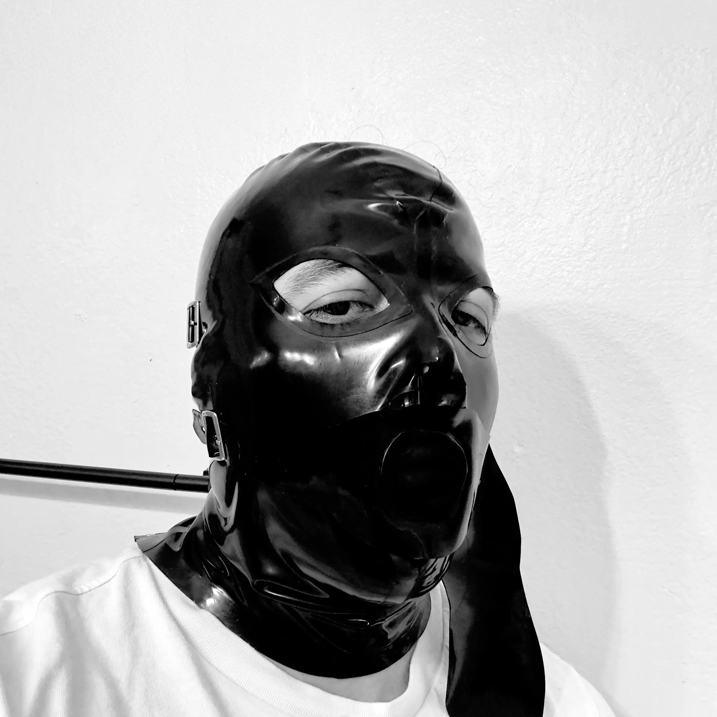 First full latex hood.