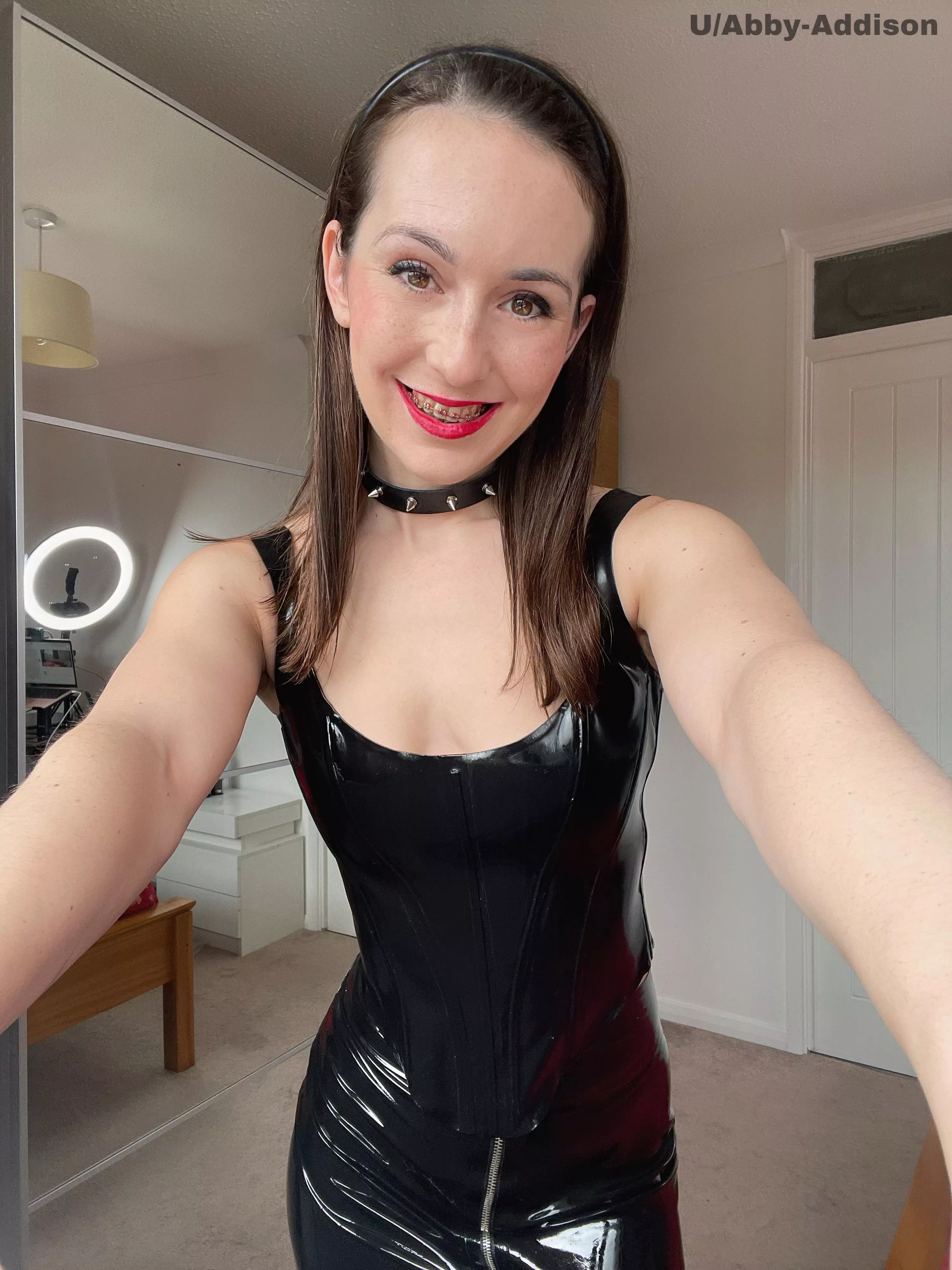 I think I wearing a sexy tight latex outfit brings my brace face smile out. 