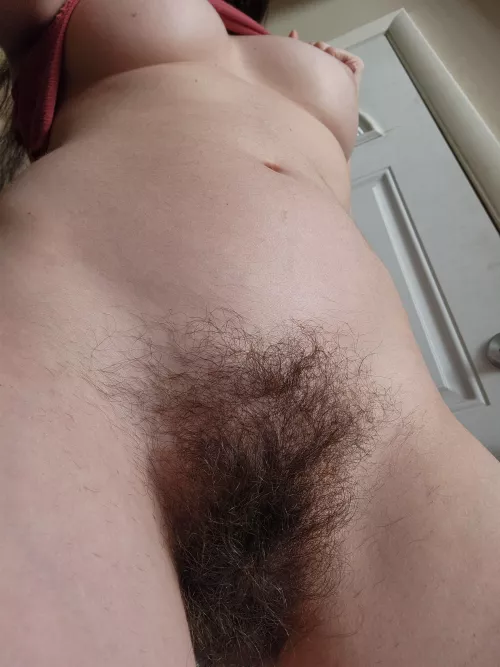 Under my bush is my horny clit waiting to cum out