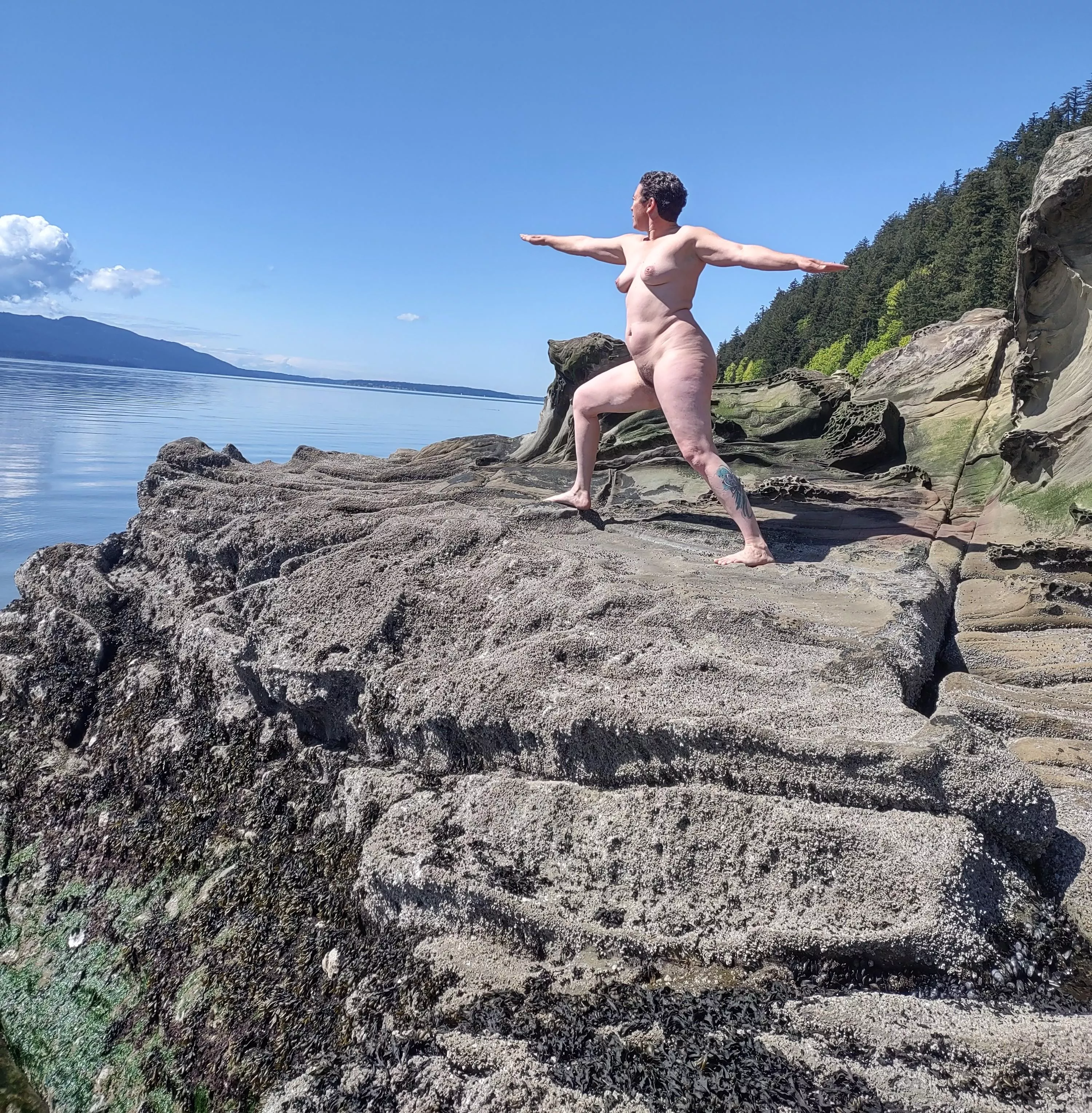 Warrior pose at the nude beach