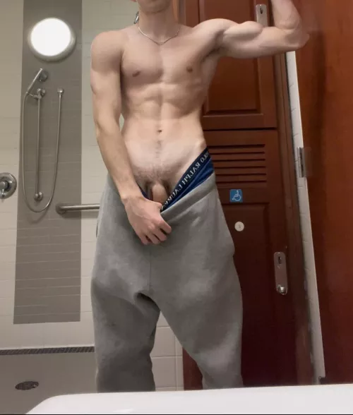 flexing in the gym locker room showers m18