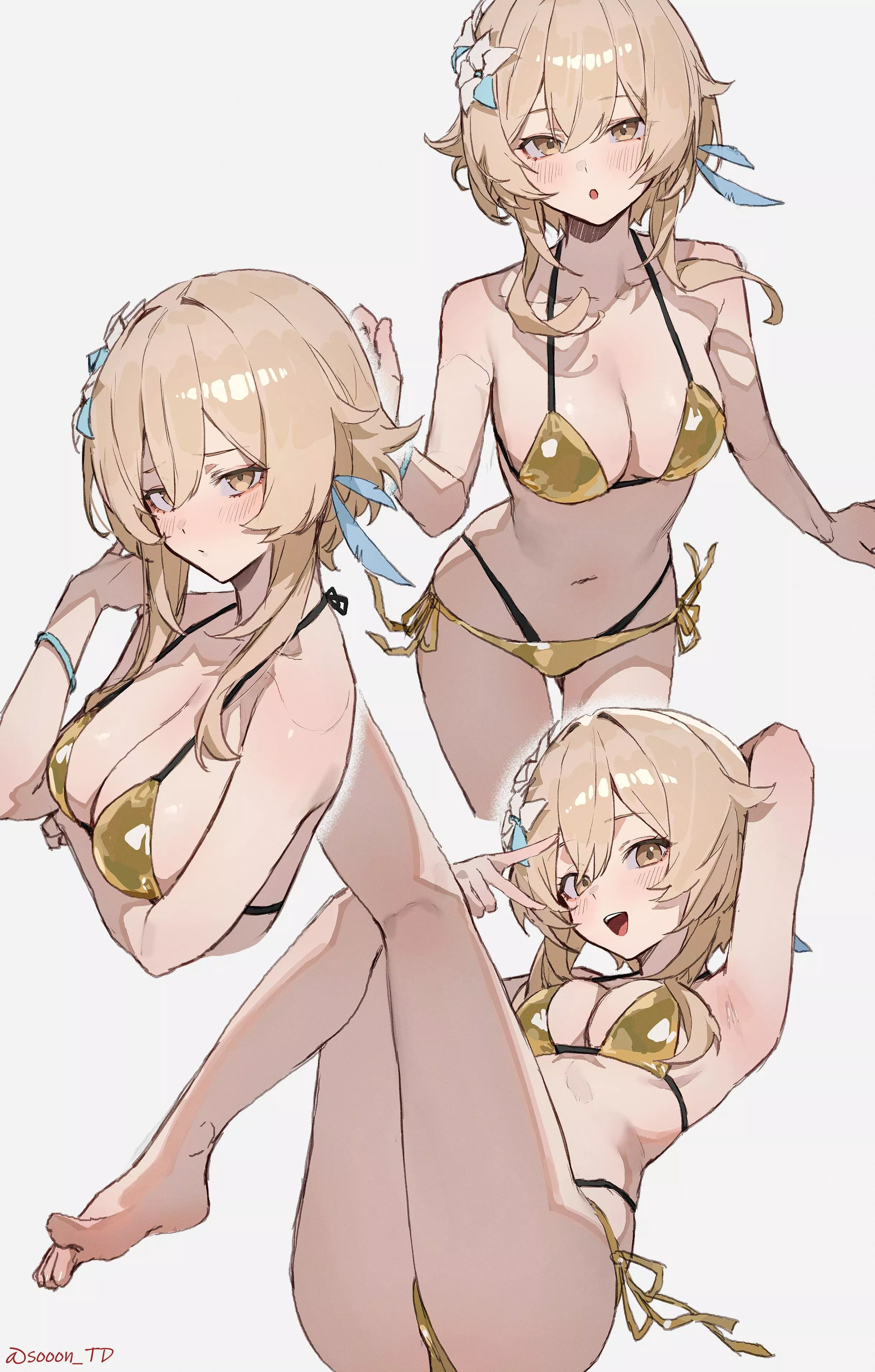 Poses in a golden bikini