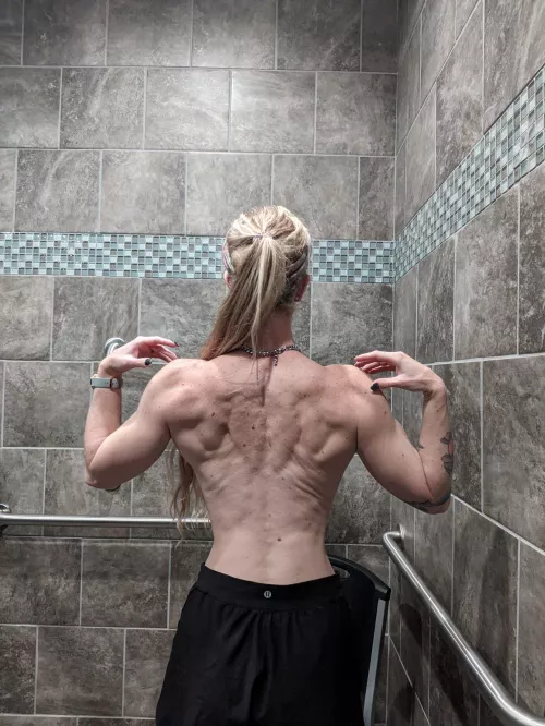 Hitting some poses in the locker room. The lighting was doing me right.