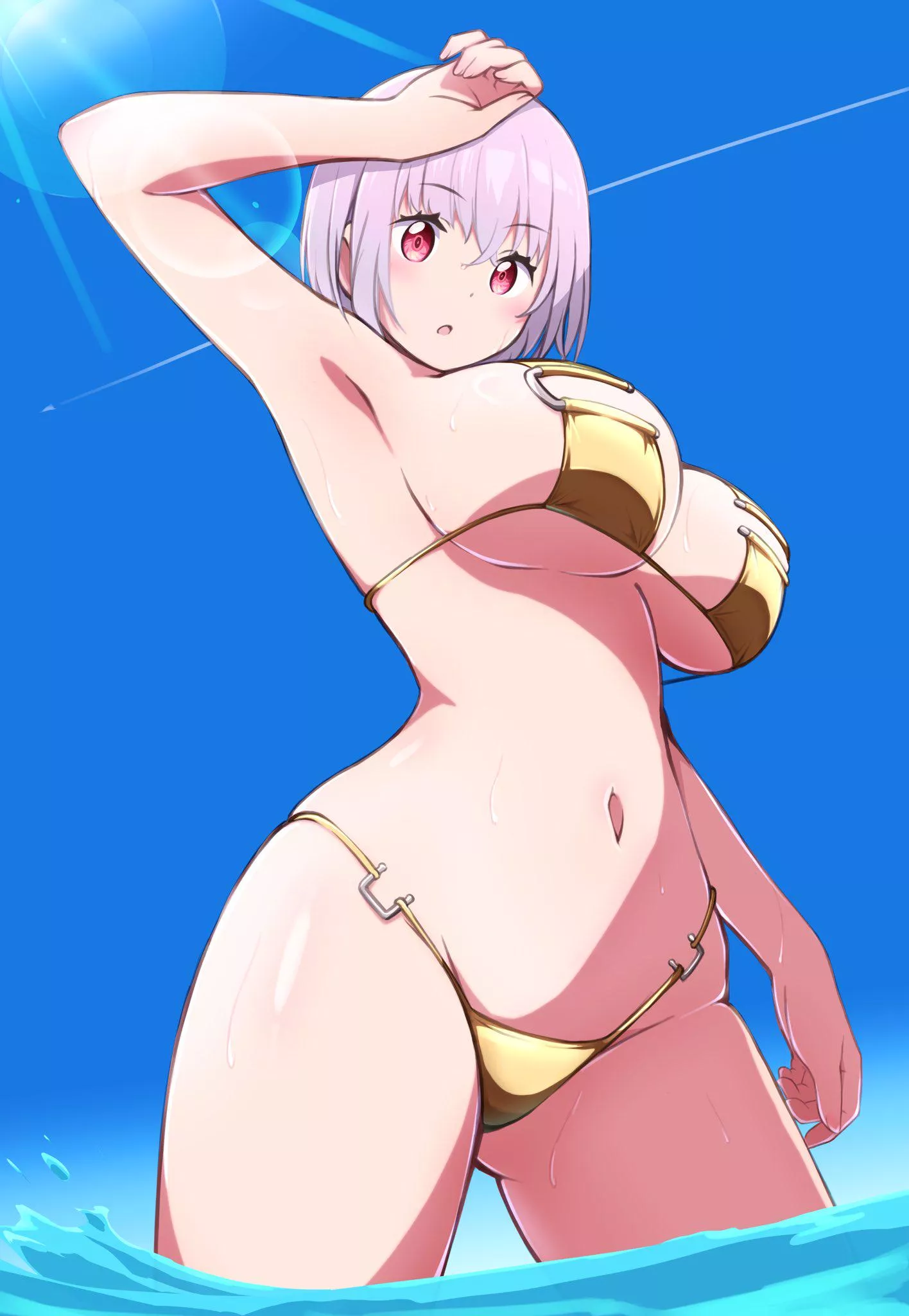 Akane in a gold bikini