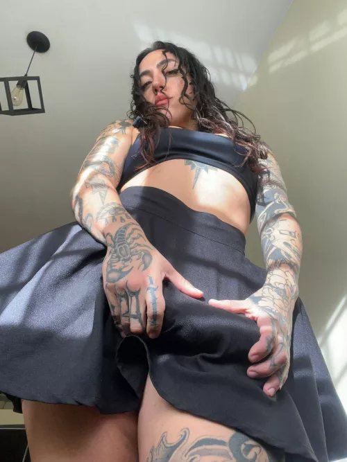 I Will give you a clue, its black like my skirt, and its huge