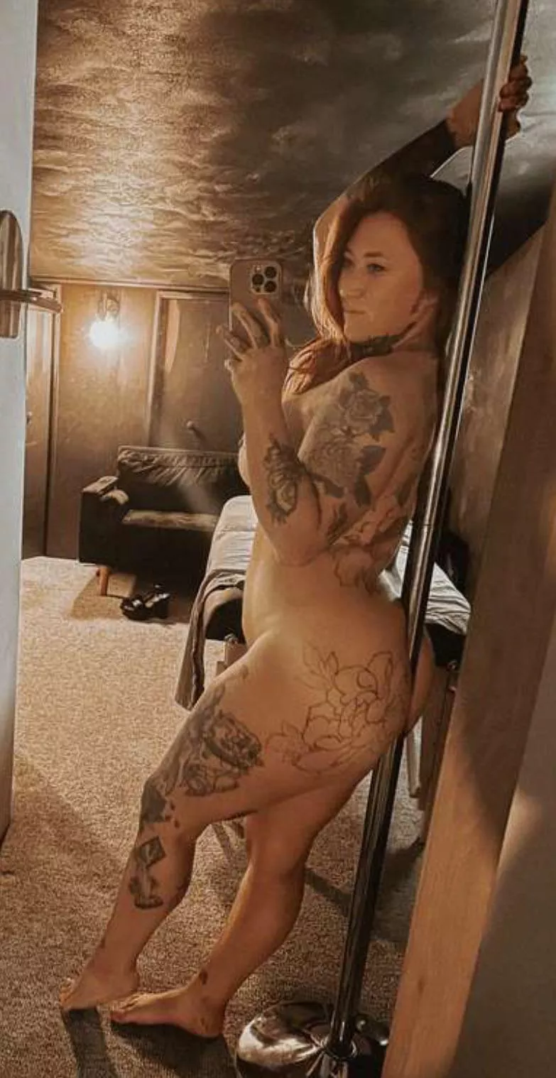 Tattoos and a thick ass.