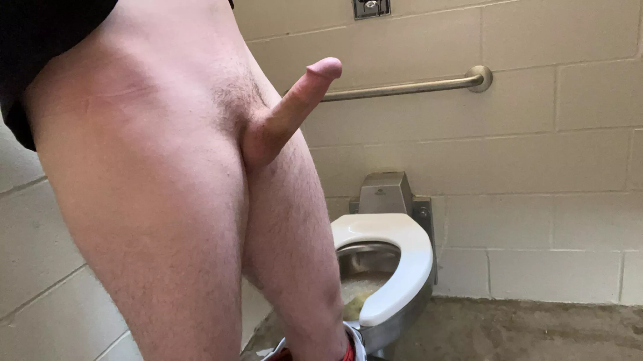 jerking off at the public bathroom and someone tried opening the door