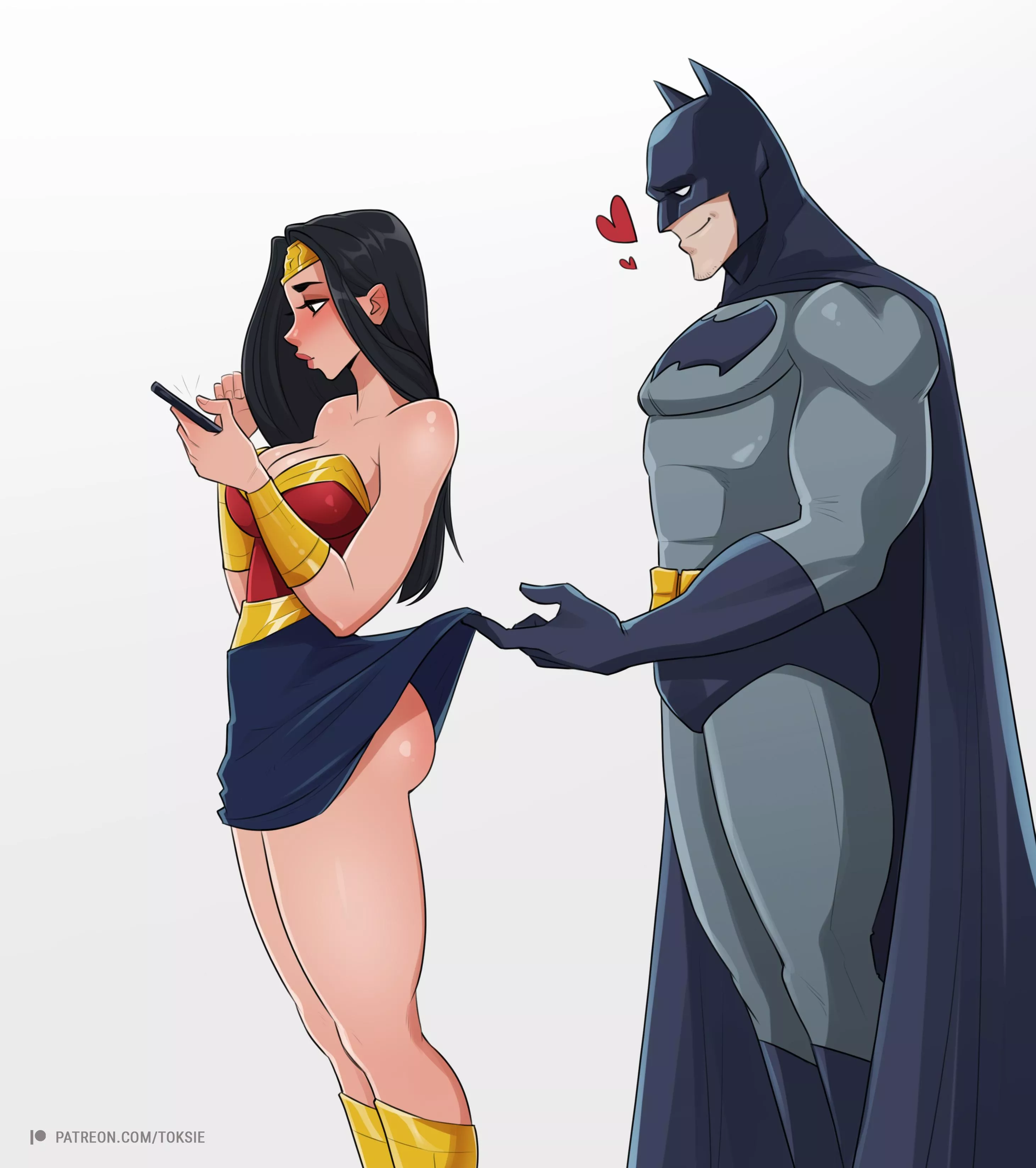 Batman fools around with Wonder Woman (toksie)