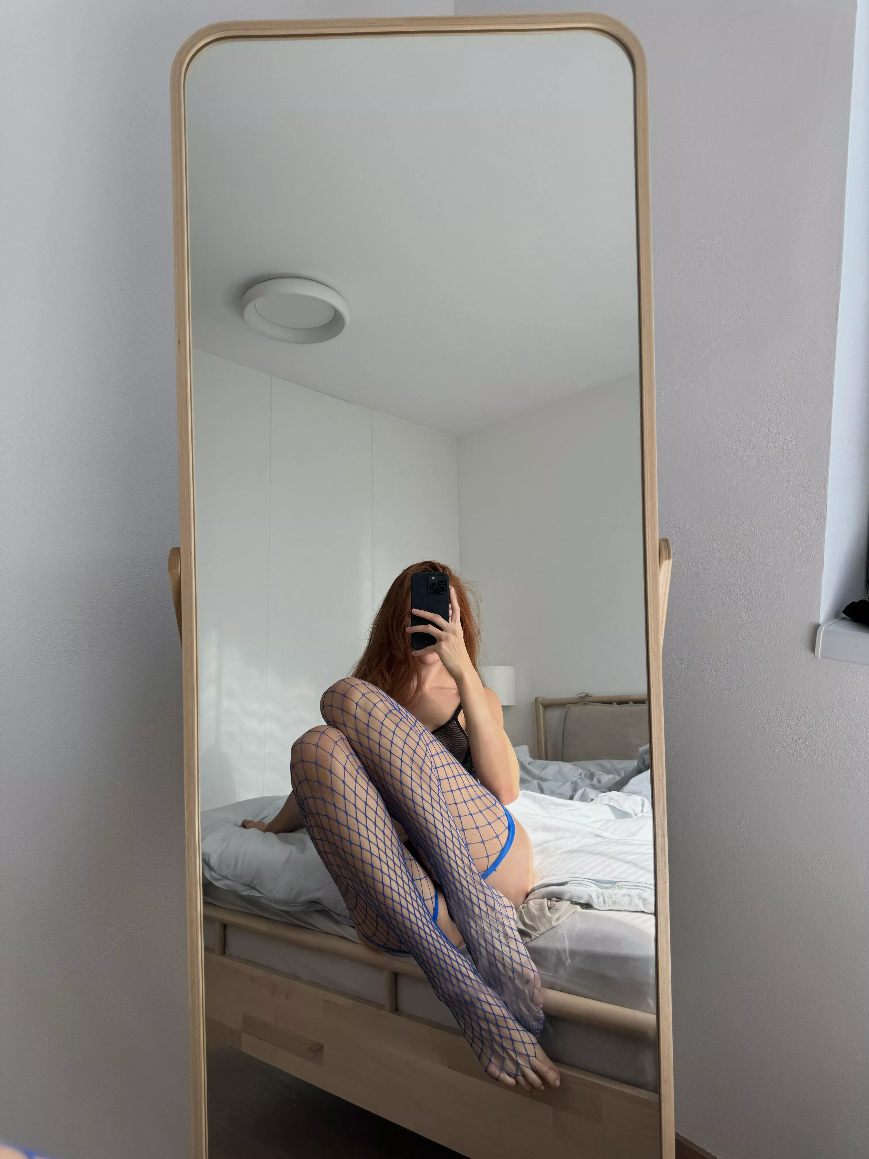 my long legs look damn sexy in fishnets