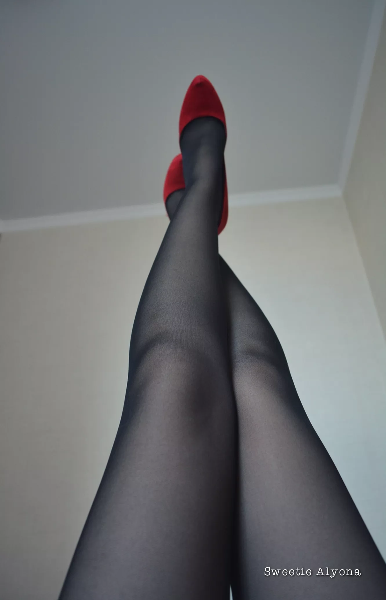 Stockings and red high heels 