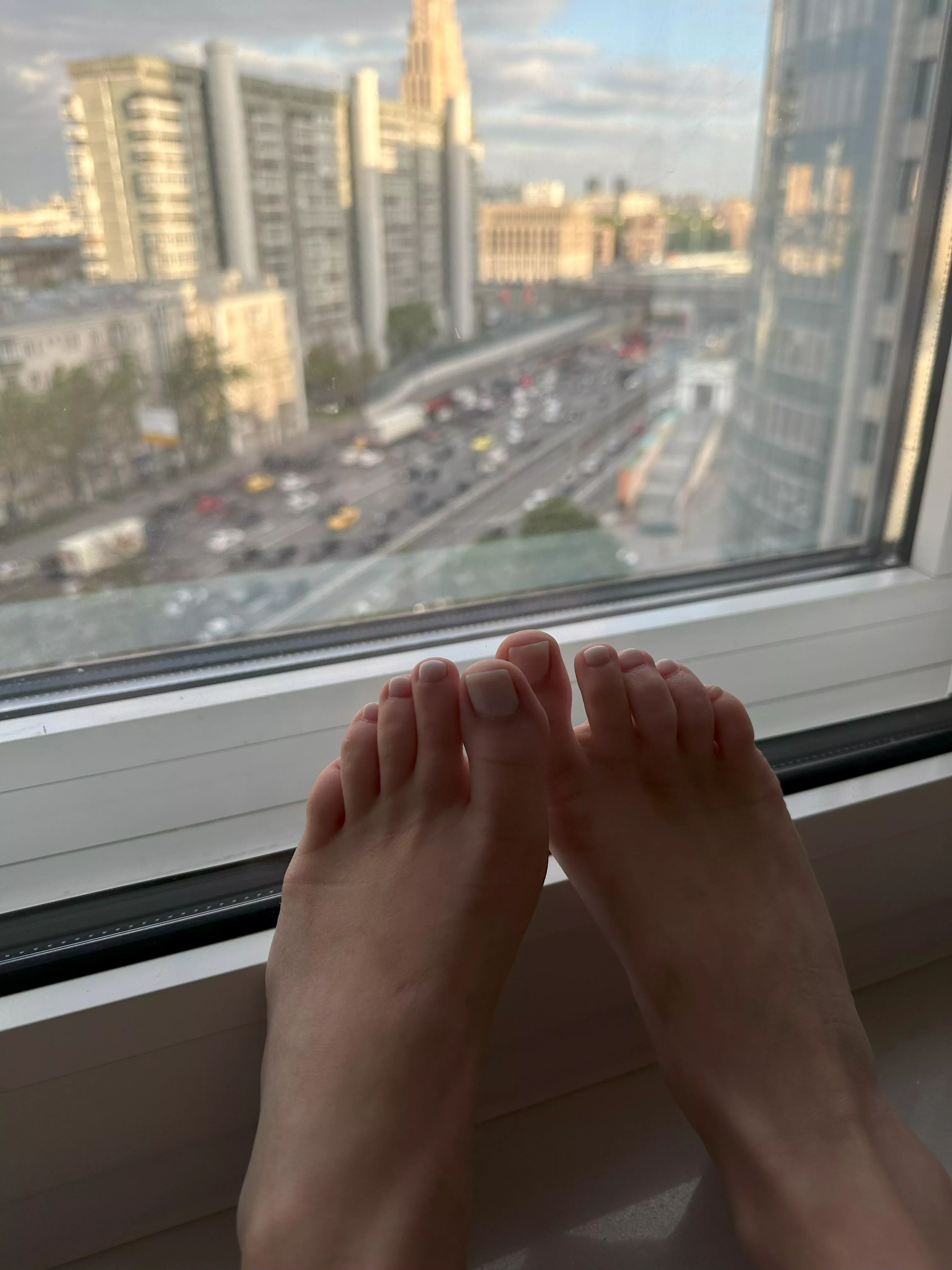 It's finally a sunny day Feet, painted toes and the beginnings of a tan.