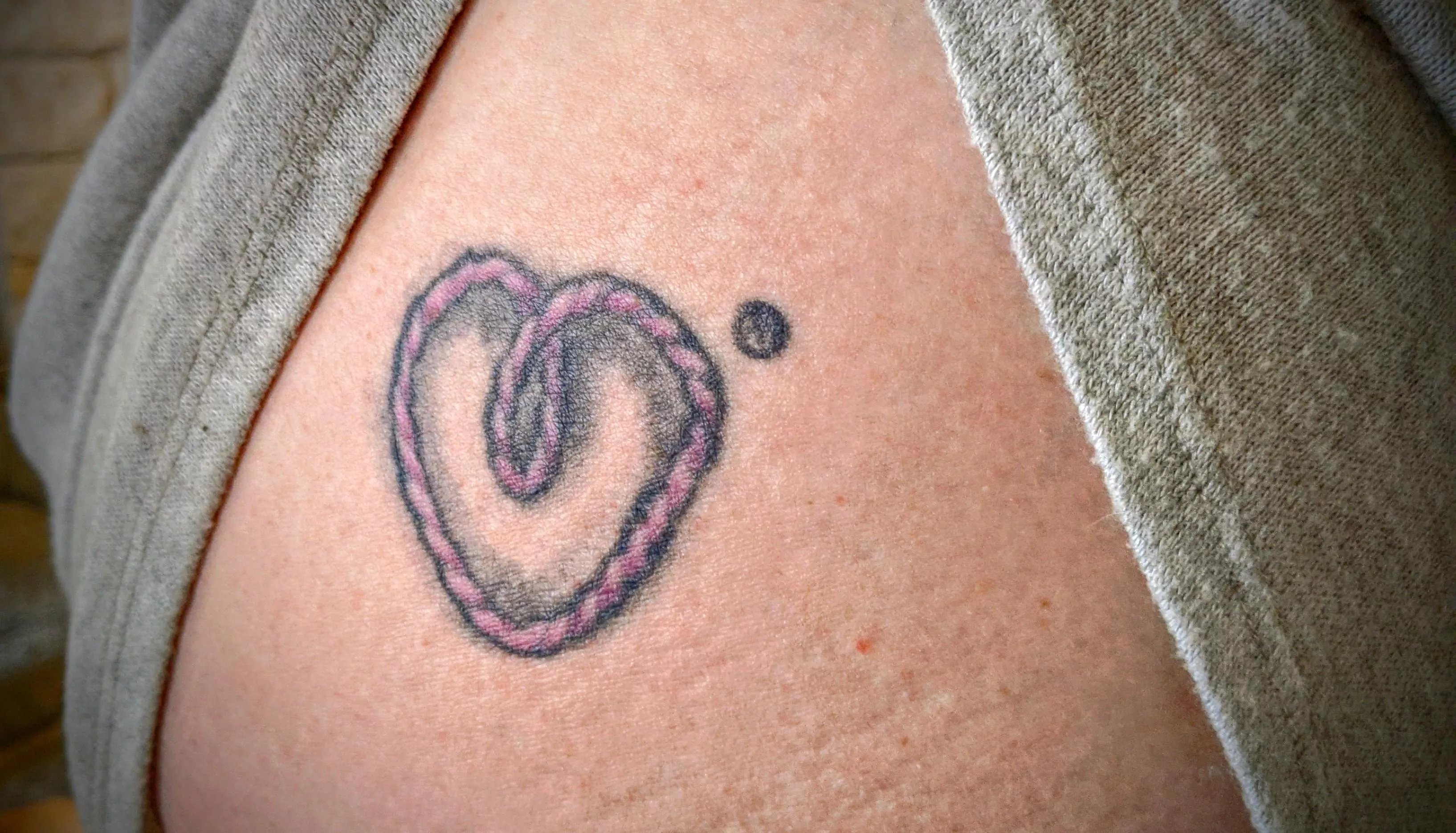 Dee Luvbight can be identified by the tattoo on her right ass cheek.  We actually had our logo registered with the USPTO.