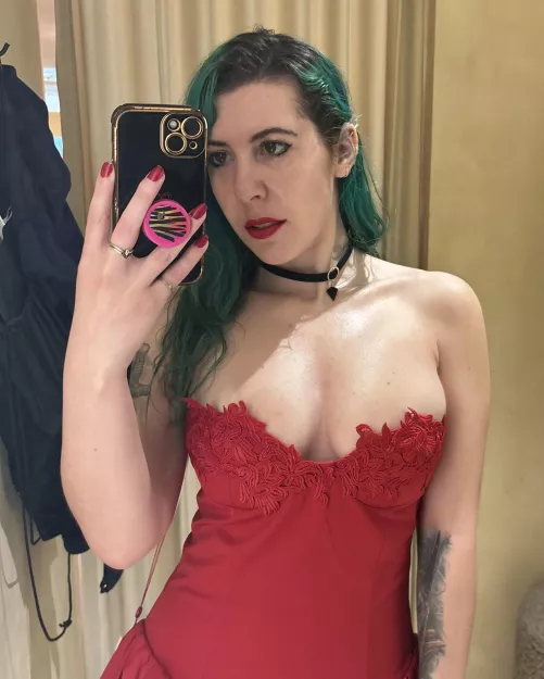 Braless in a red dress