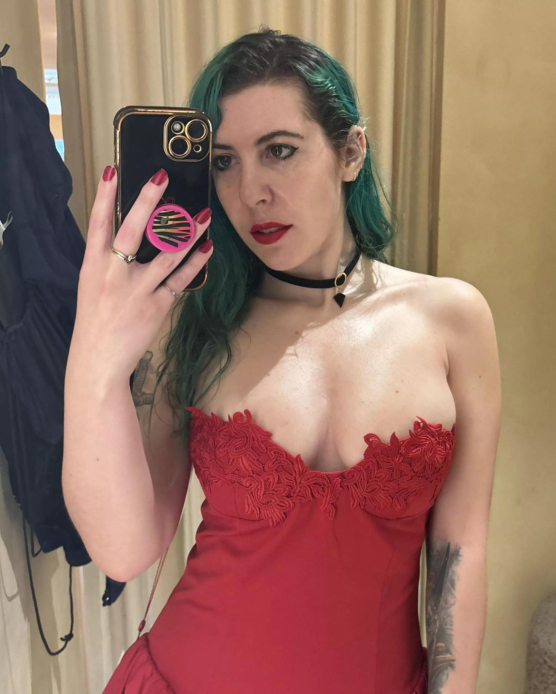 Braless in a red dress