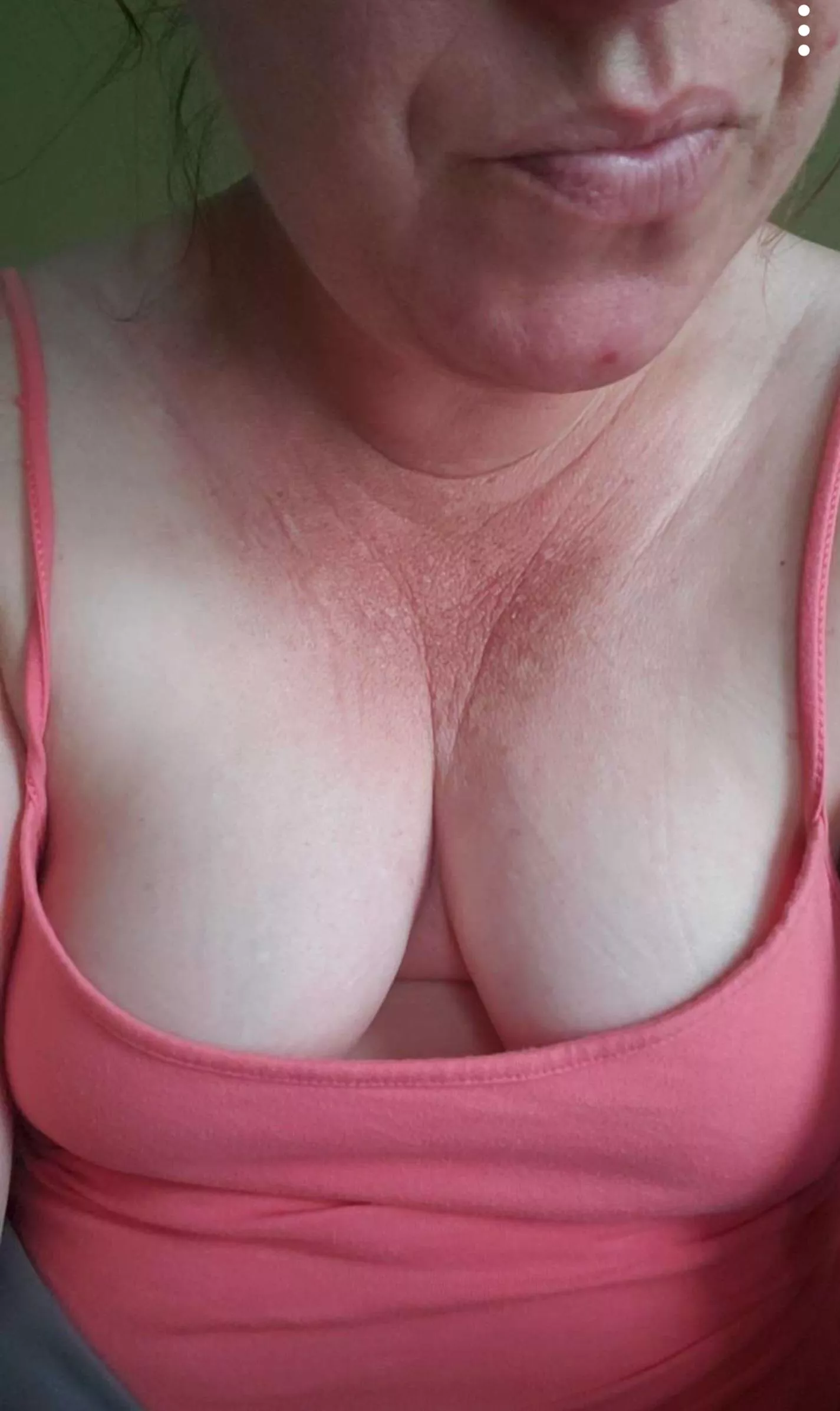 Cleavage and tan lines. 
