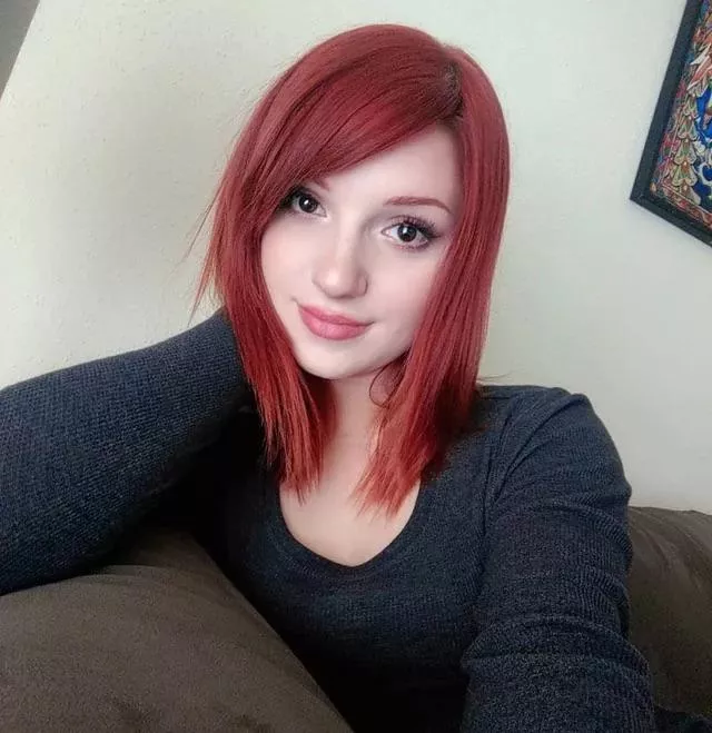 Madison relaxing on her couch 